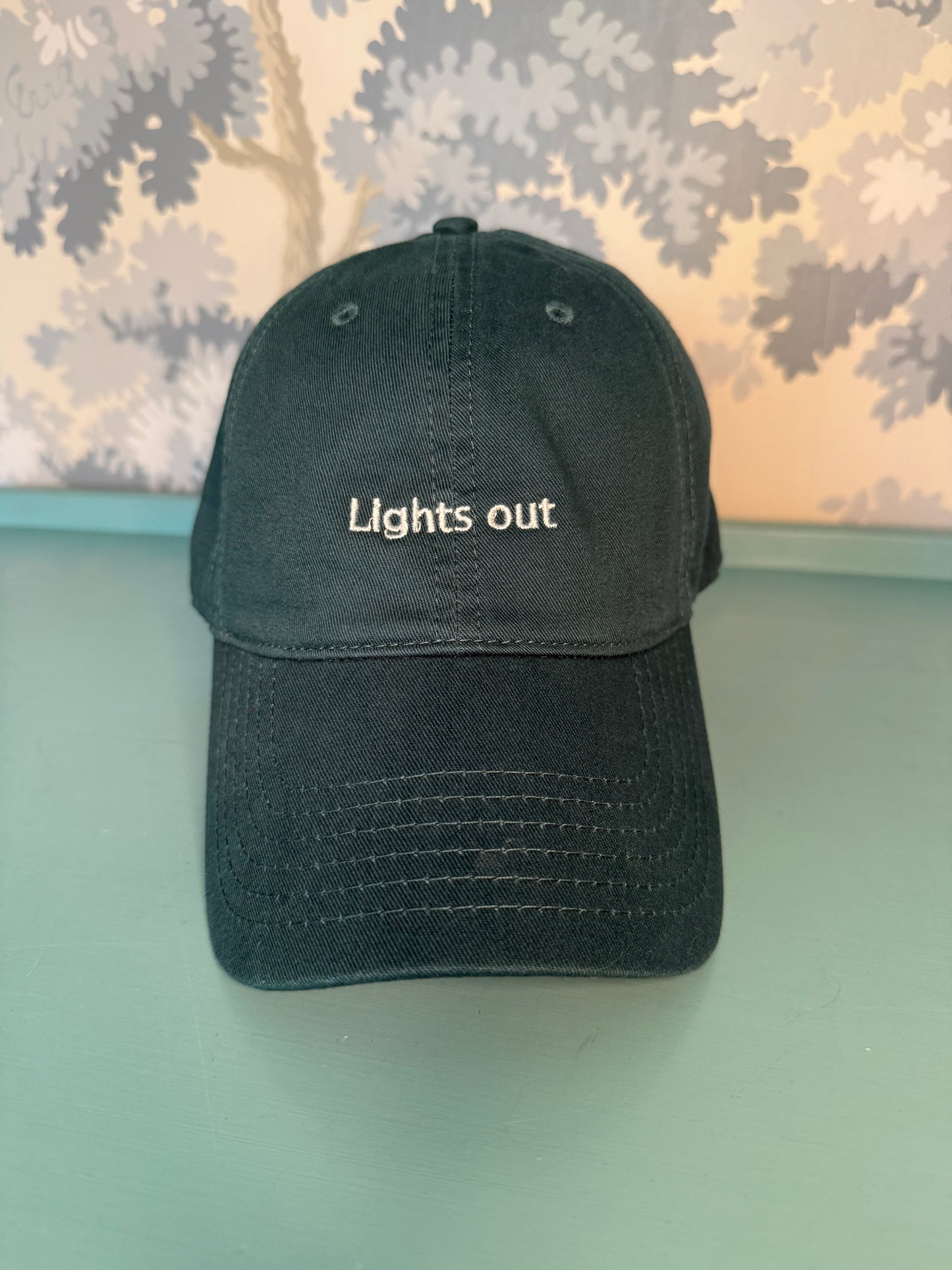 It's Lights Out.. and Away we go dad cap duo